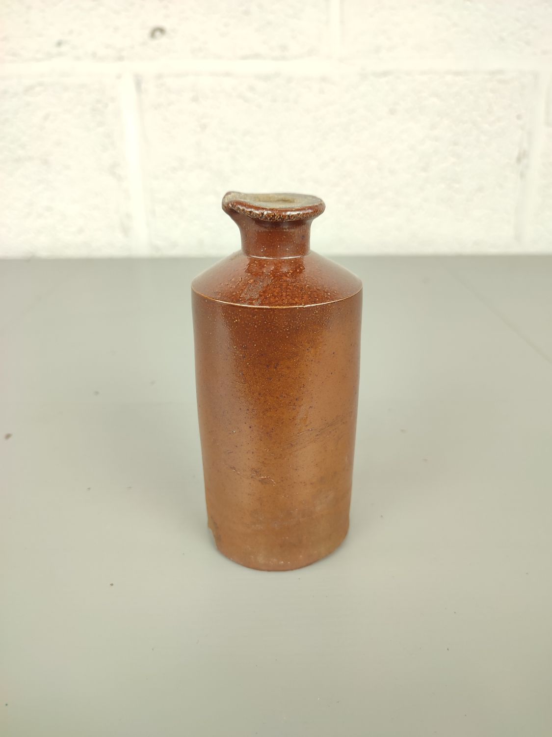 Antique earthenware inkbottle