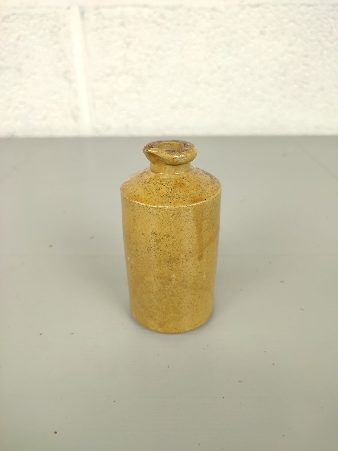 Antique earthenware inkbottle