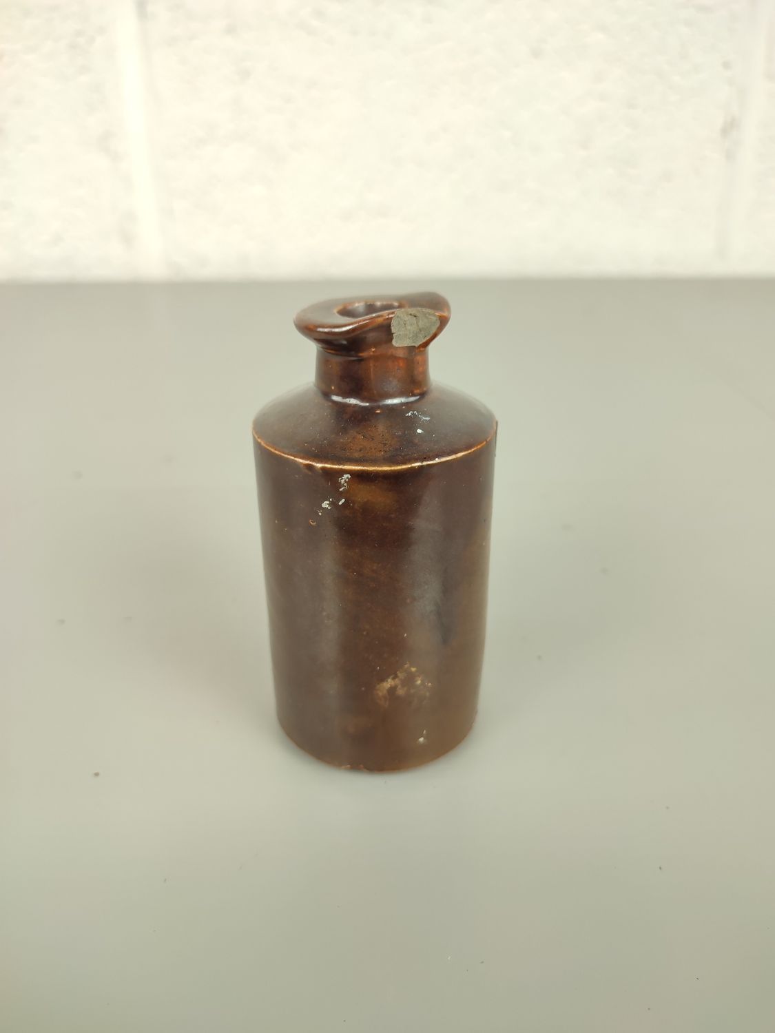 Antique earthenware inkbottle