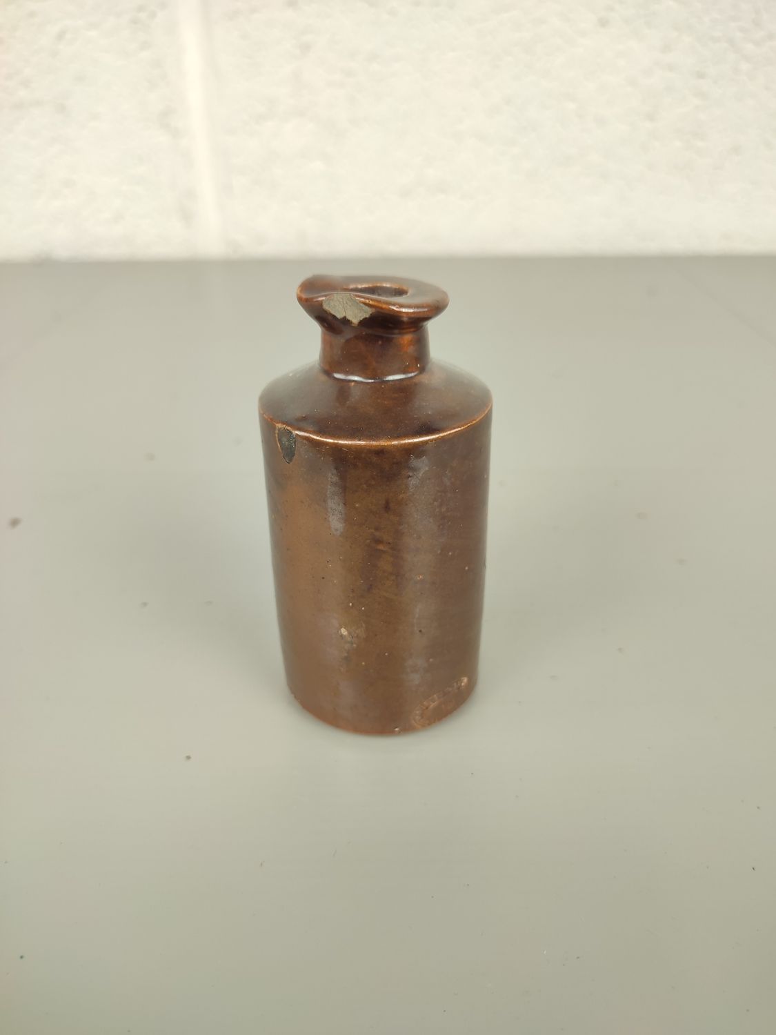 Antique earthenware inkbottle