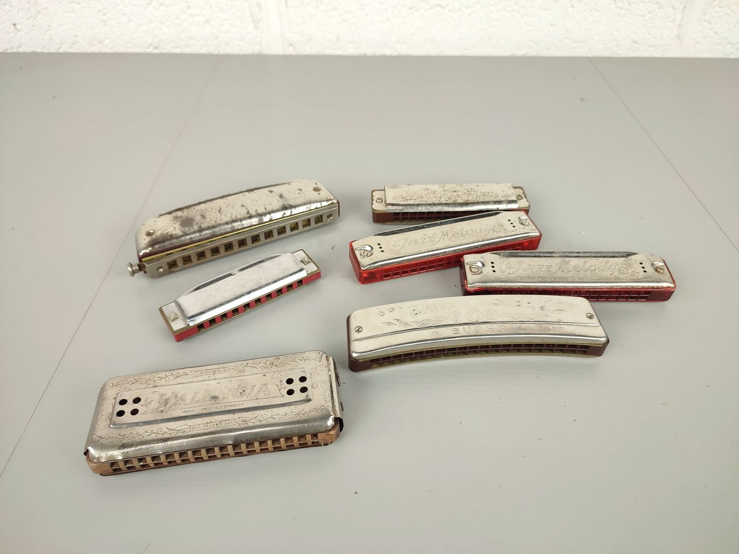 7 vintage harmonicas