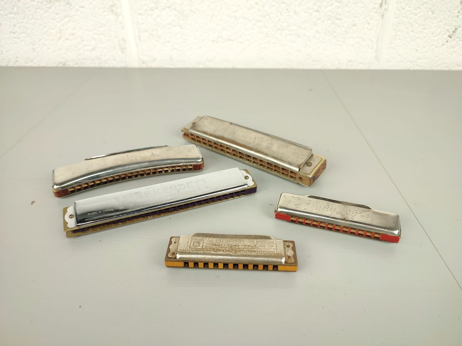 7 vintage Hohner harmonicas