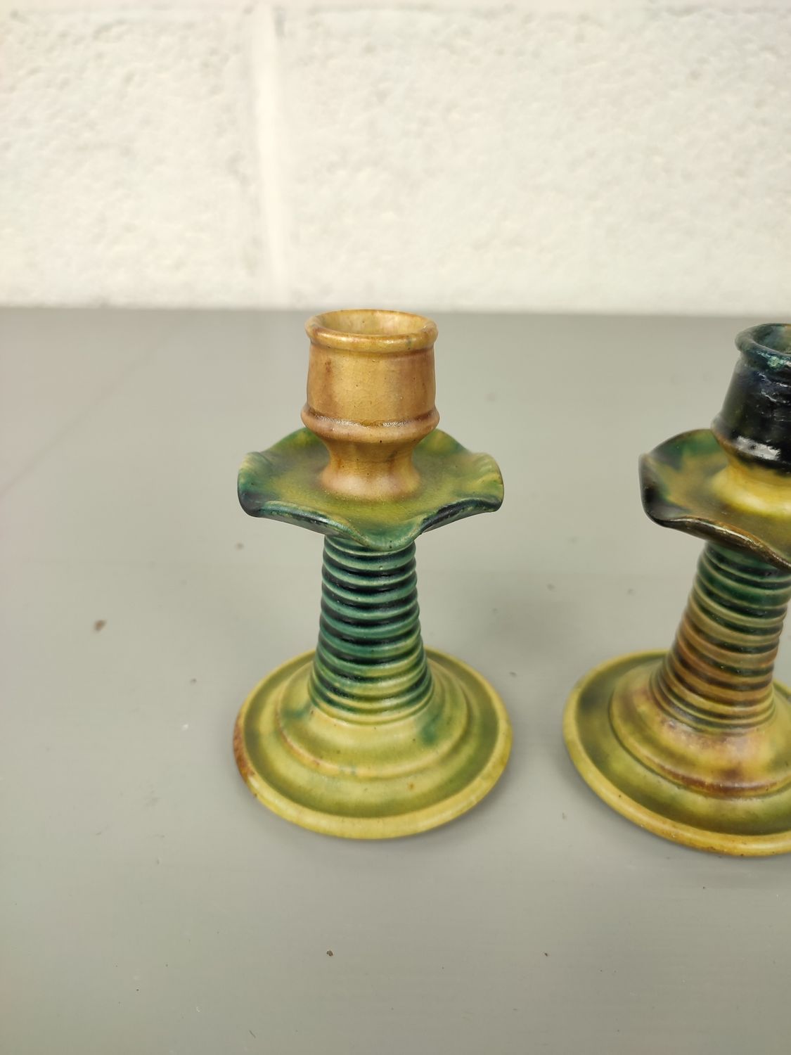 Pair of candlestick in Flemish earthenware