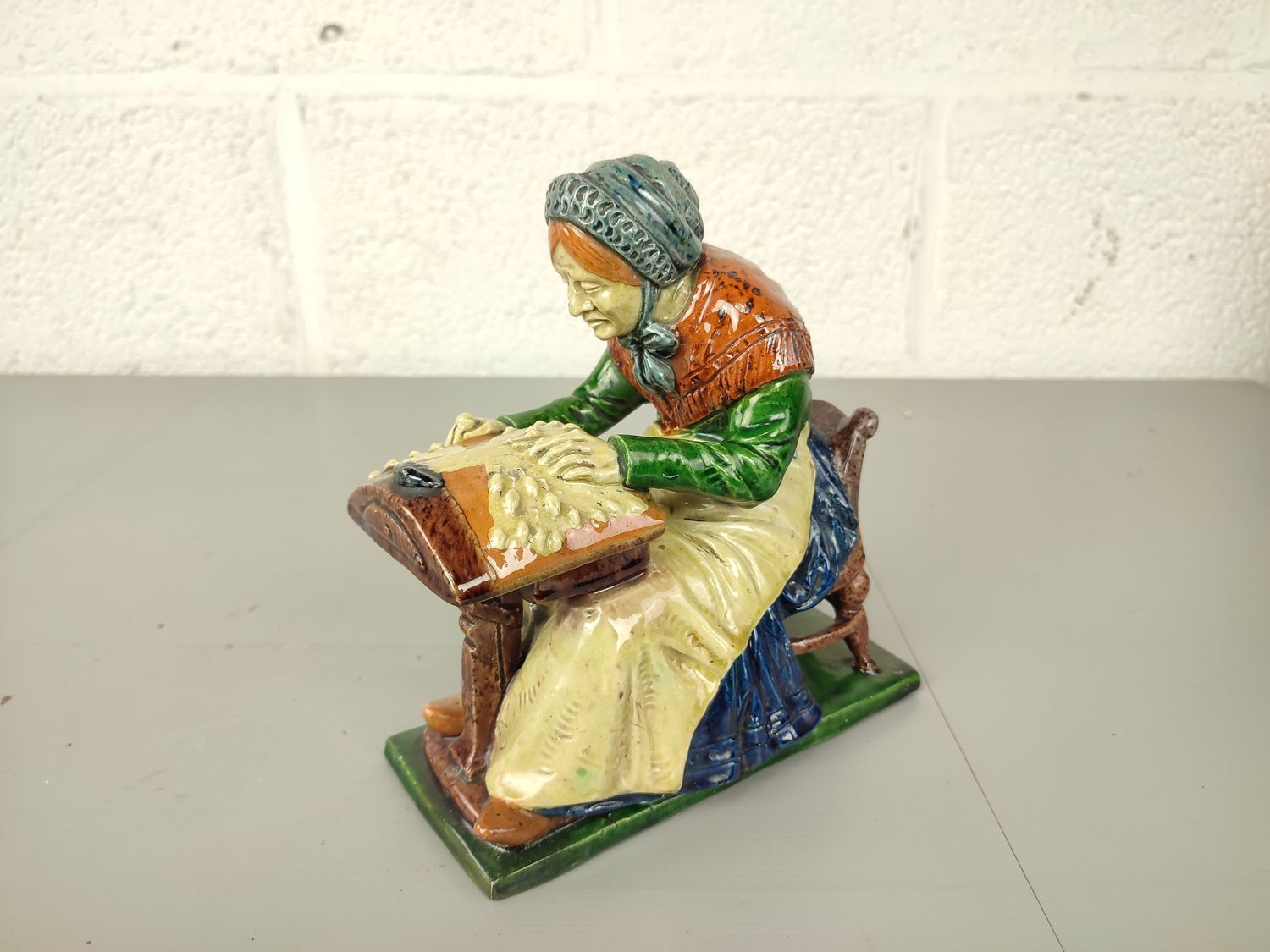 Lacemaker in Flemish pottery