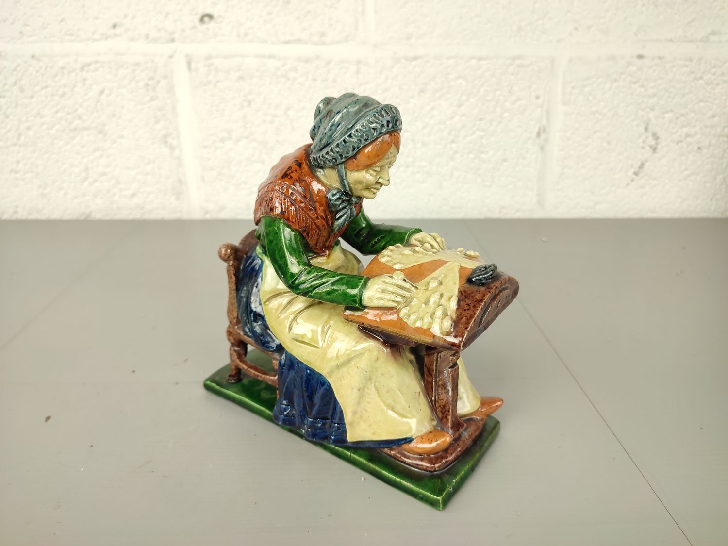 Lacemaker in Flemish pottery