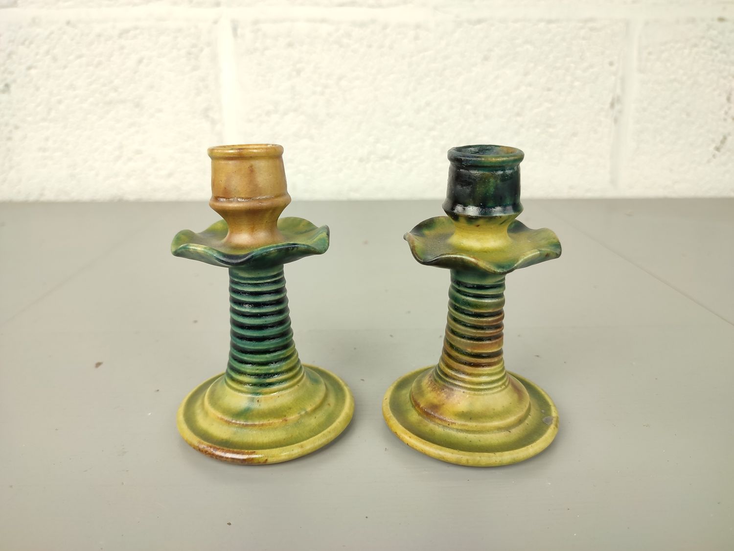 Pair of candlestick in Flemish earthenware