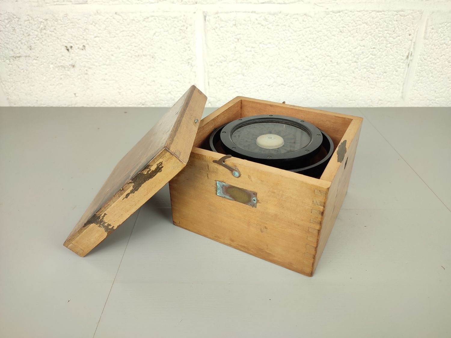 E. Vion compass in wooden box