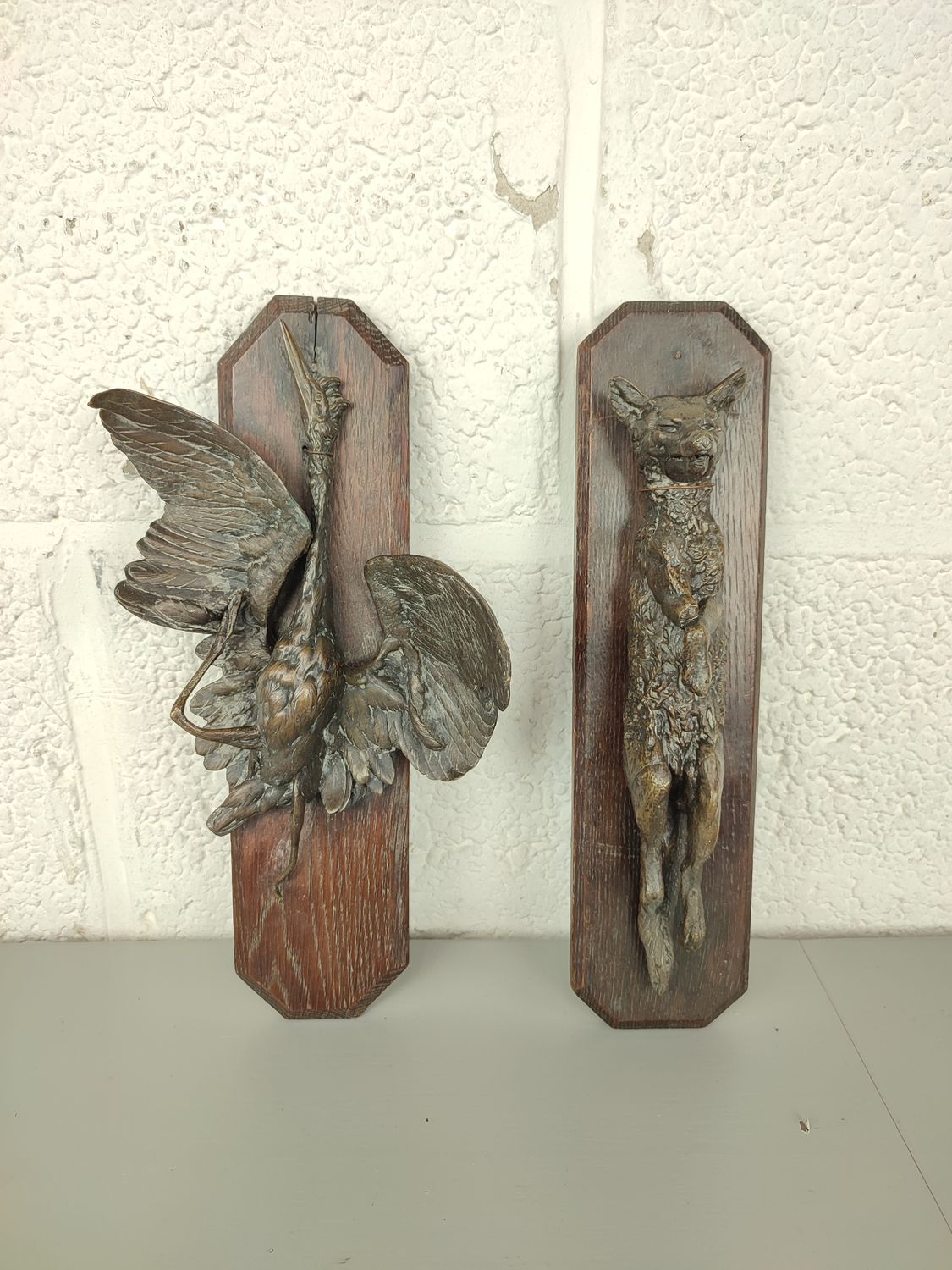 Pair of bronze hunting trophies