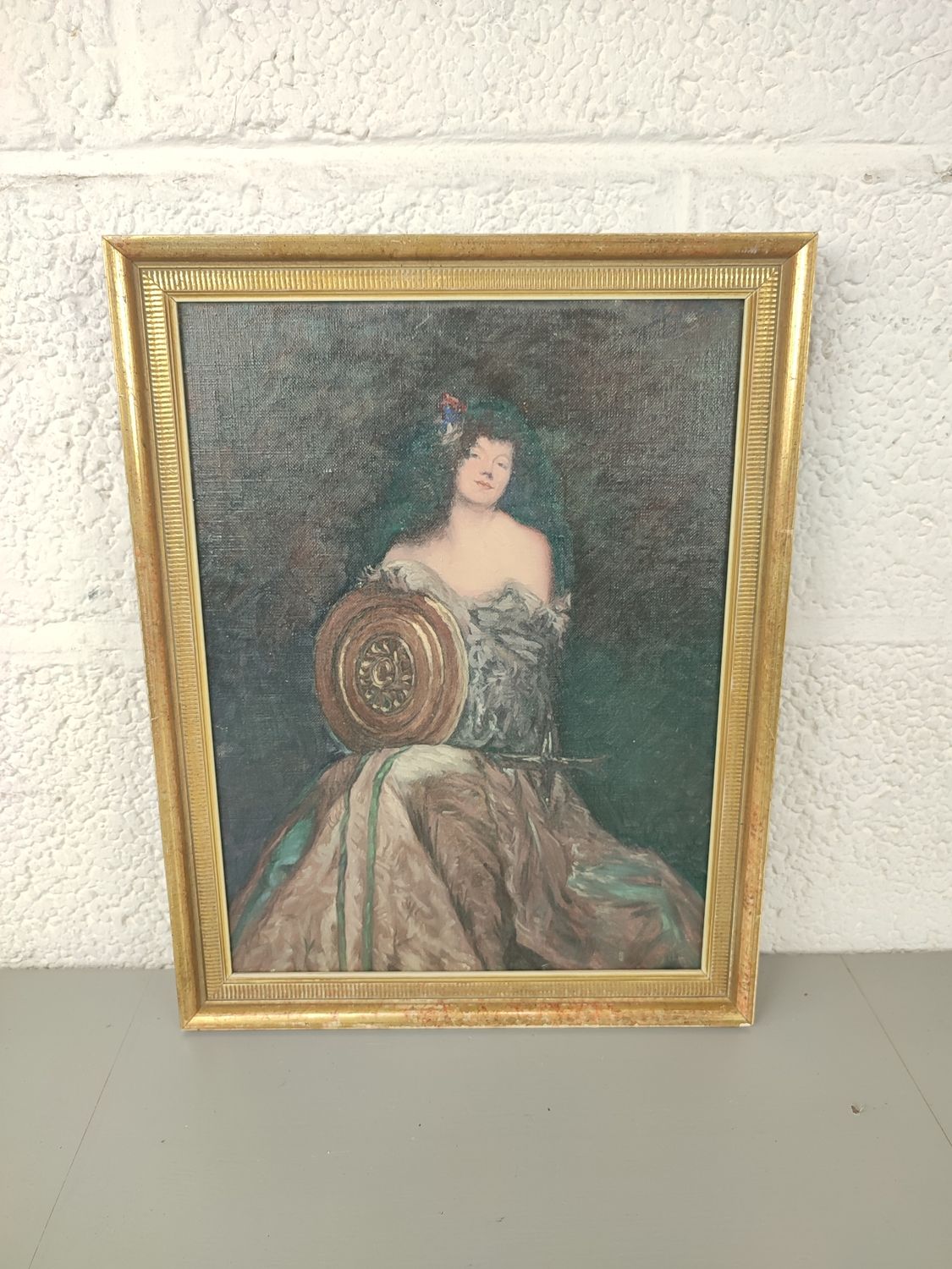 Painting of a lady with shield