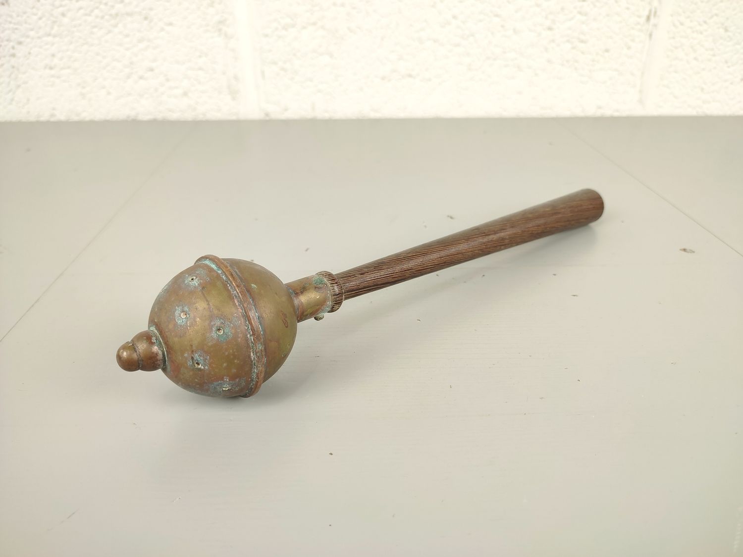 Old aspergillum for holy water