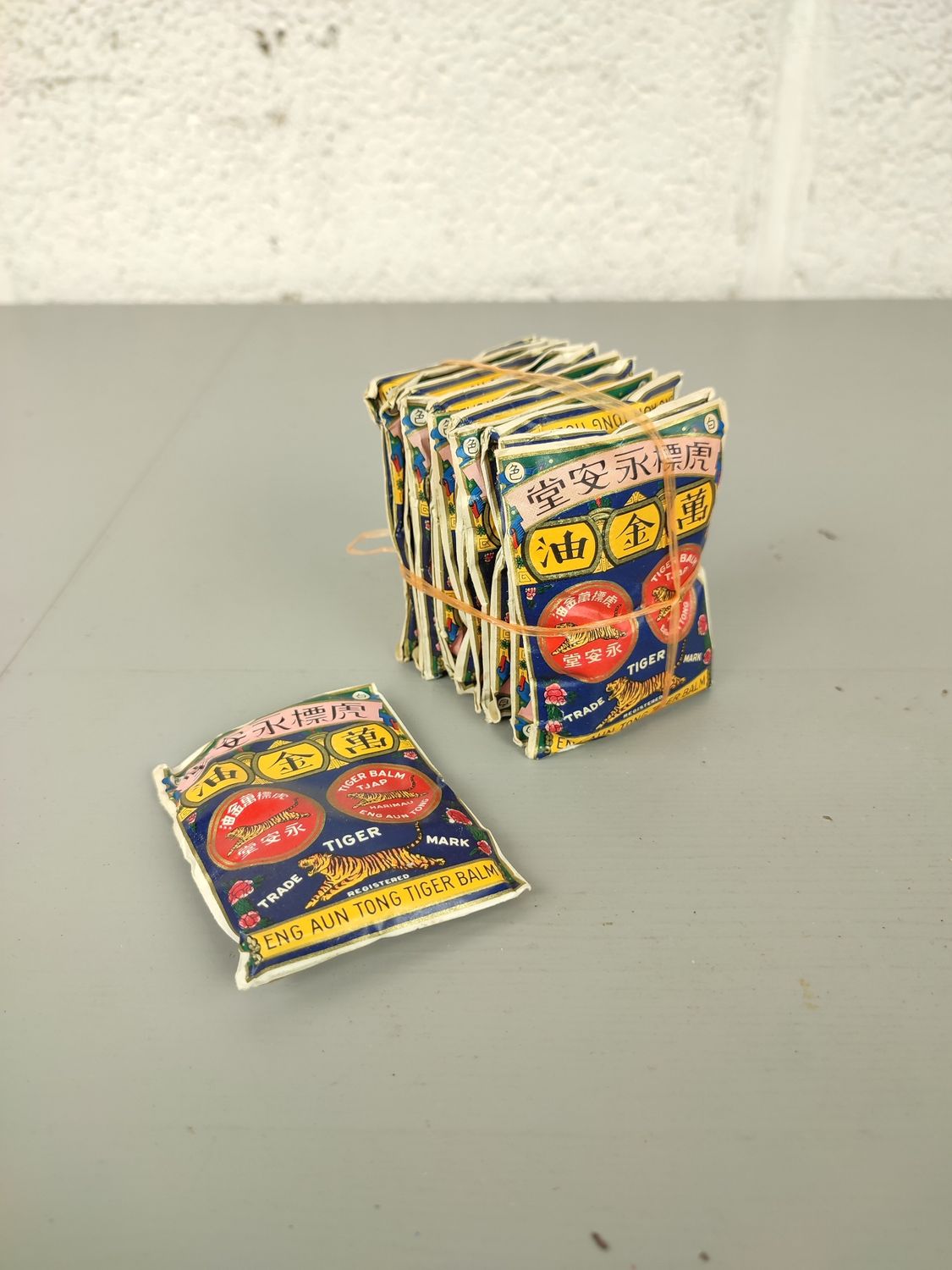12 old packets of tiger balm
