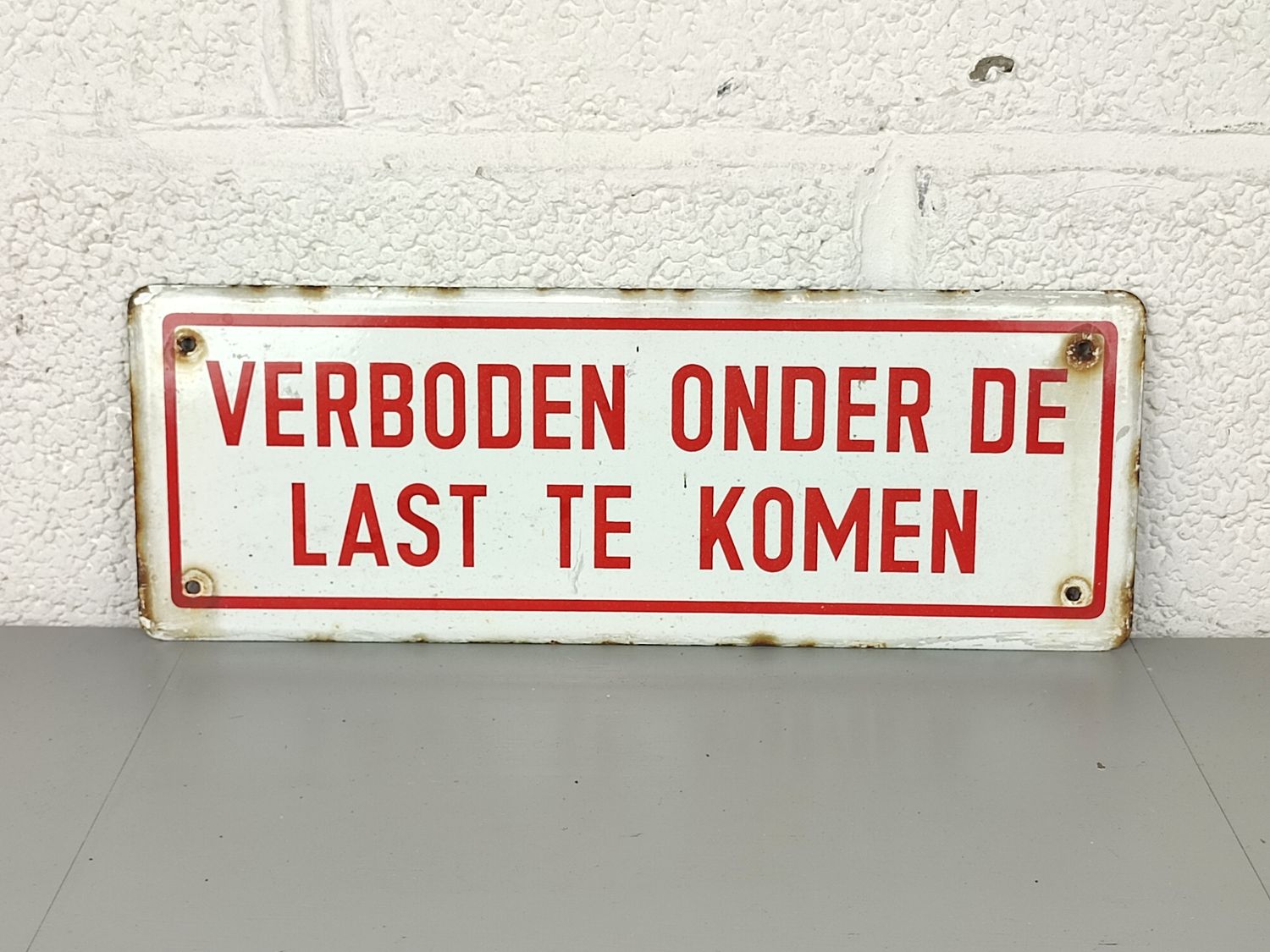 Enamel warning sign