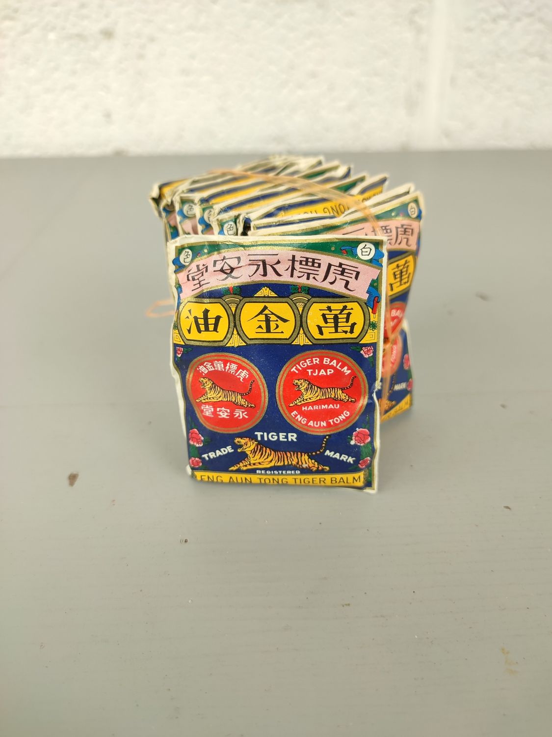 12 old packets of tiger balm
