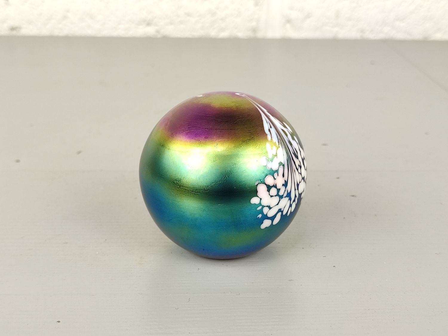 Iridescent glass paperweight