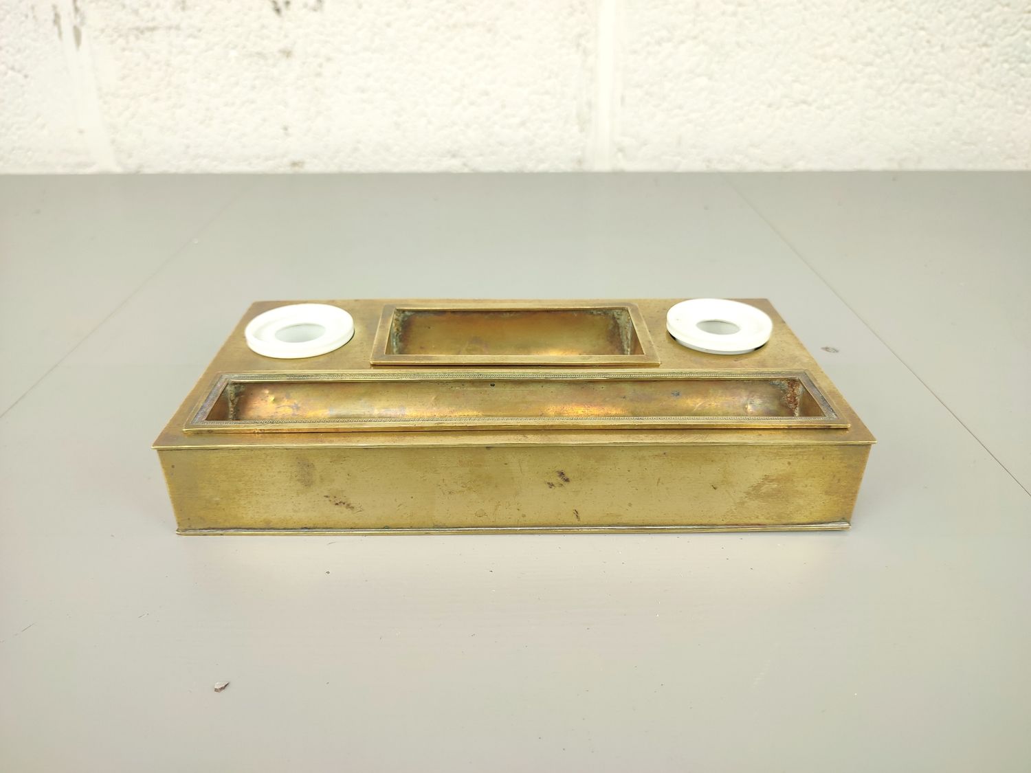 Old brass inkstand