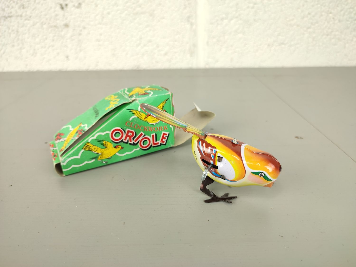 Tin toy bird