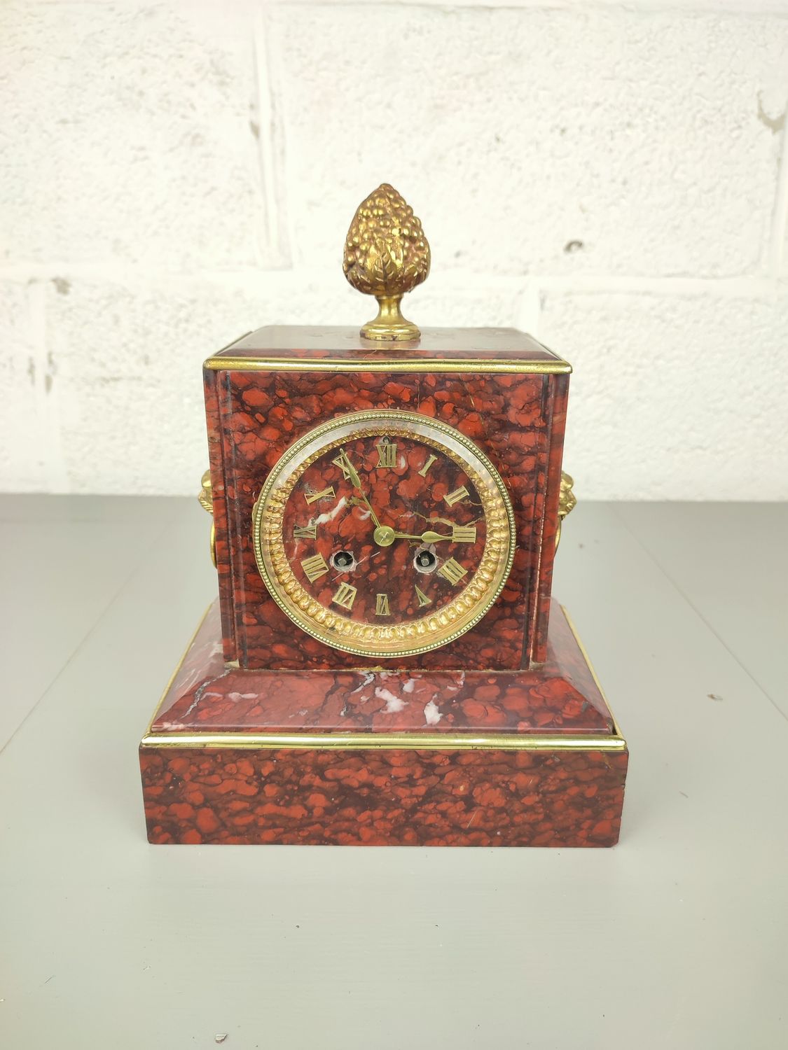 Unique red marble clock