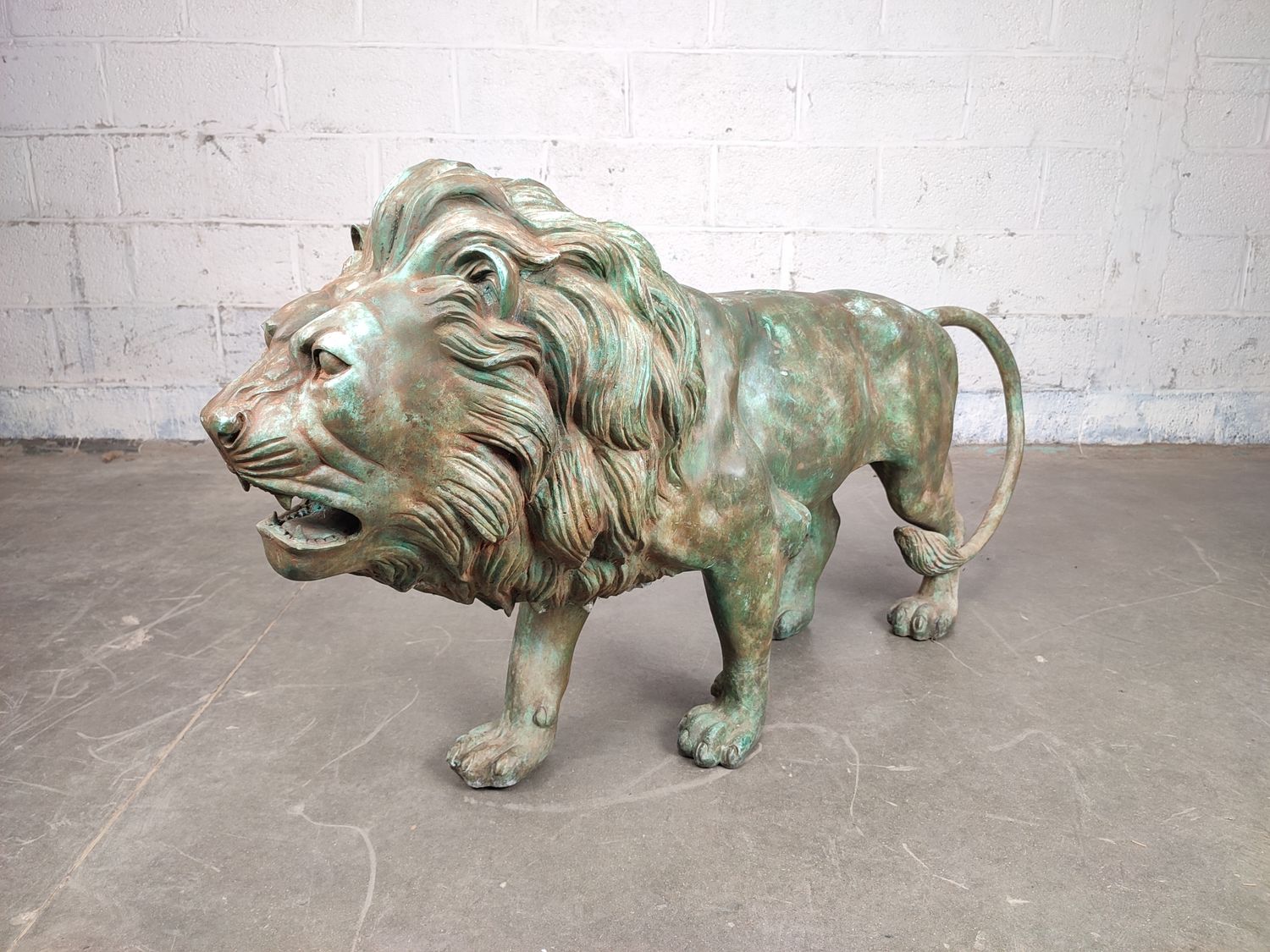 Large bronze lion by Erik Kramer