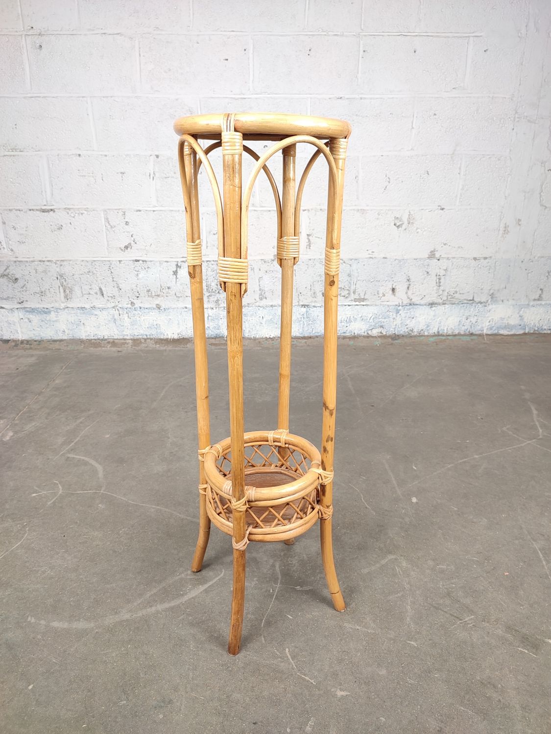Old rattan plant stand
