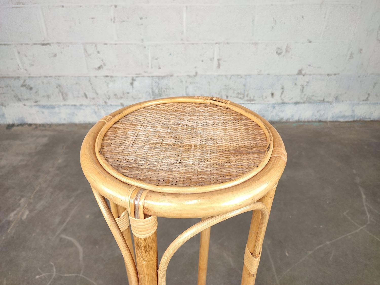 Old rattan plant stand