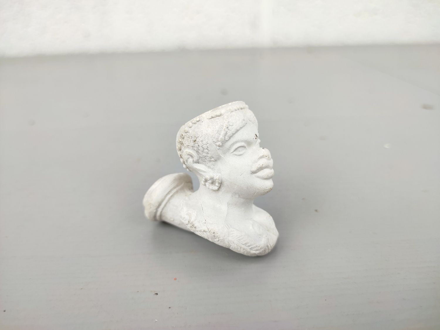 Old clay pipe head Gambier