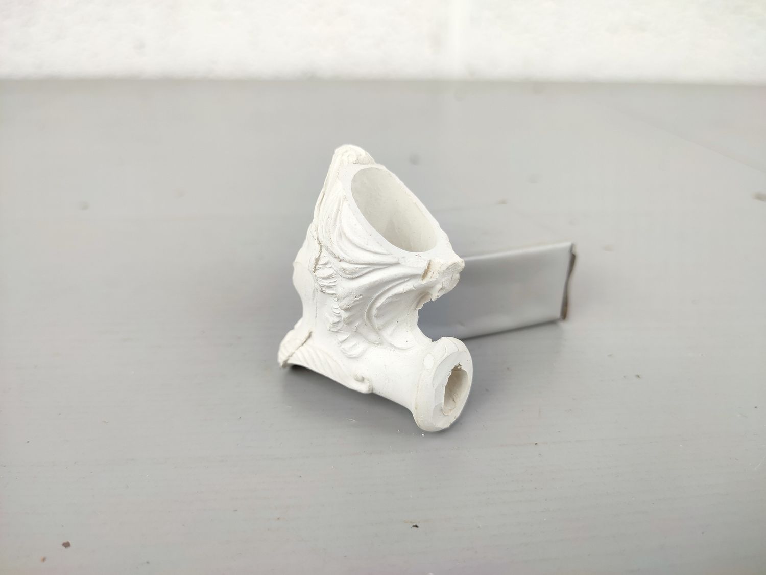 Old clay pipe head