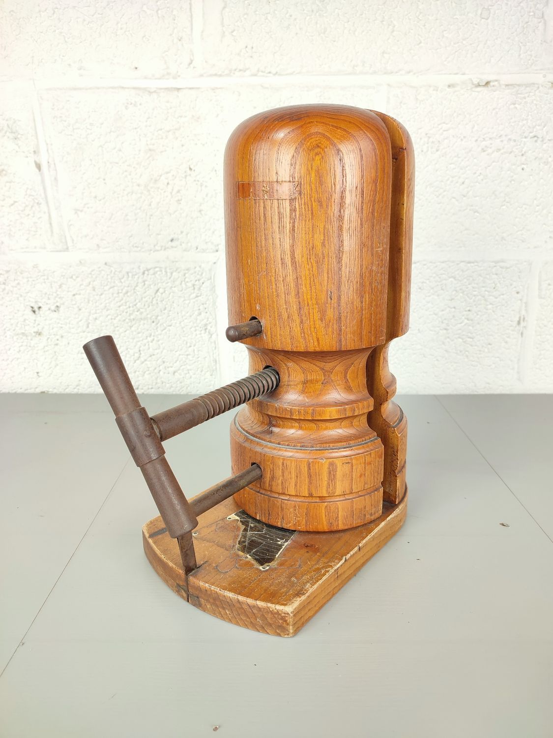 Antique wooden hat tensioner