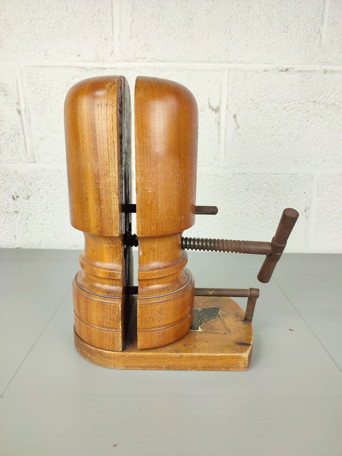 Antique wooden hat tensioner