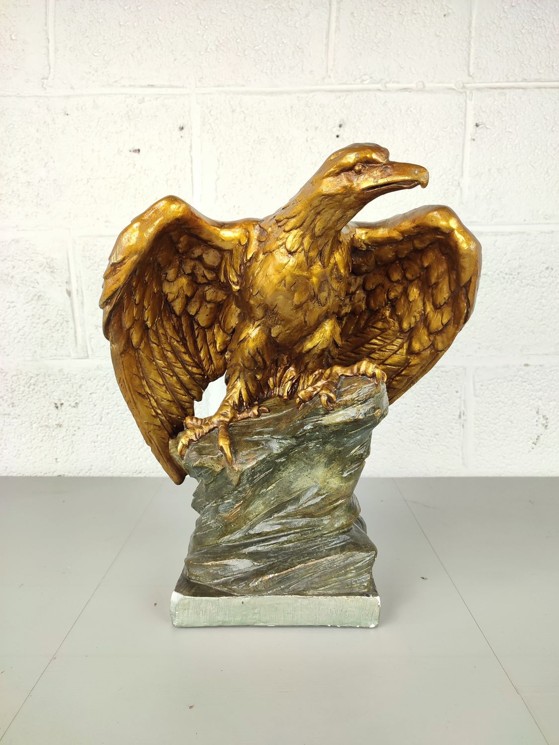 Large plaster statue of an eagle
