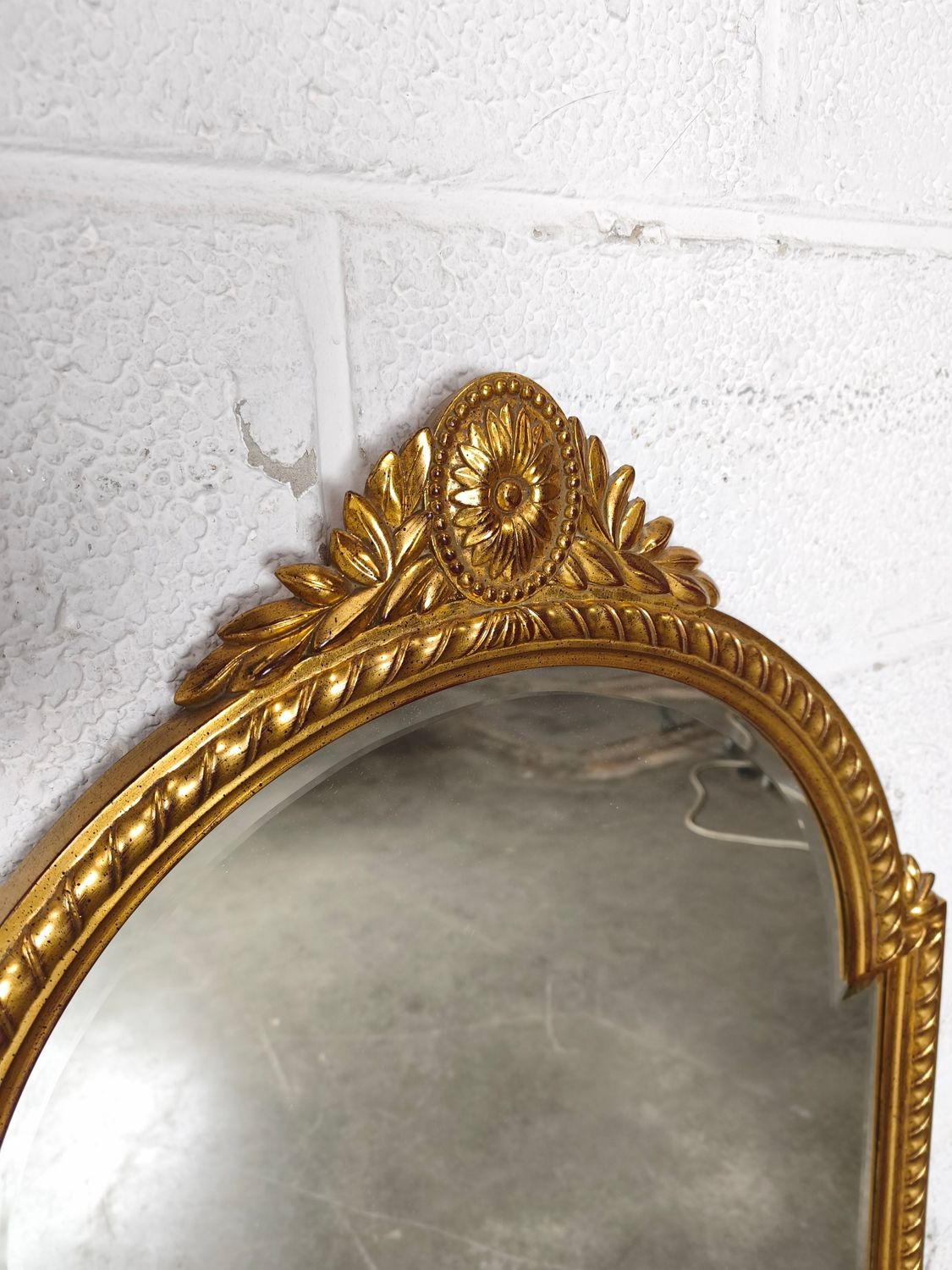Large gilded mirror Deknudt