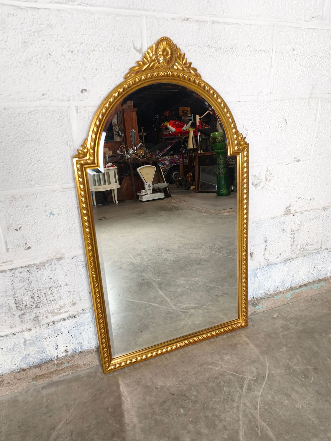 Large gilded mirror Deknudt