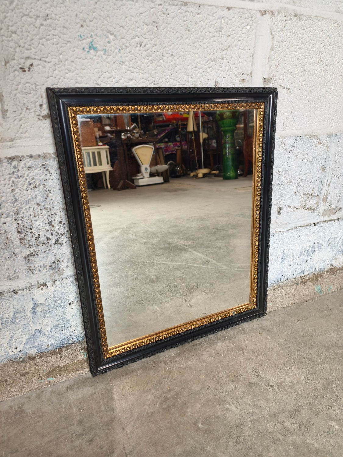 Mirror in black frame