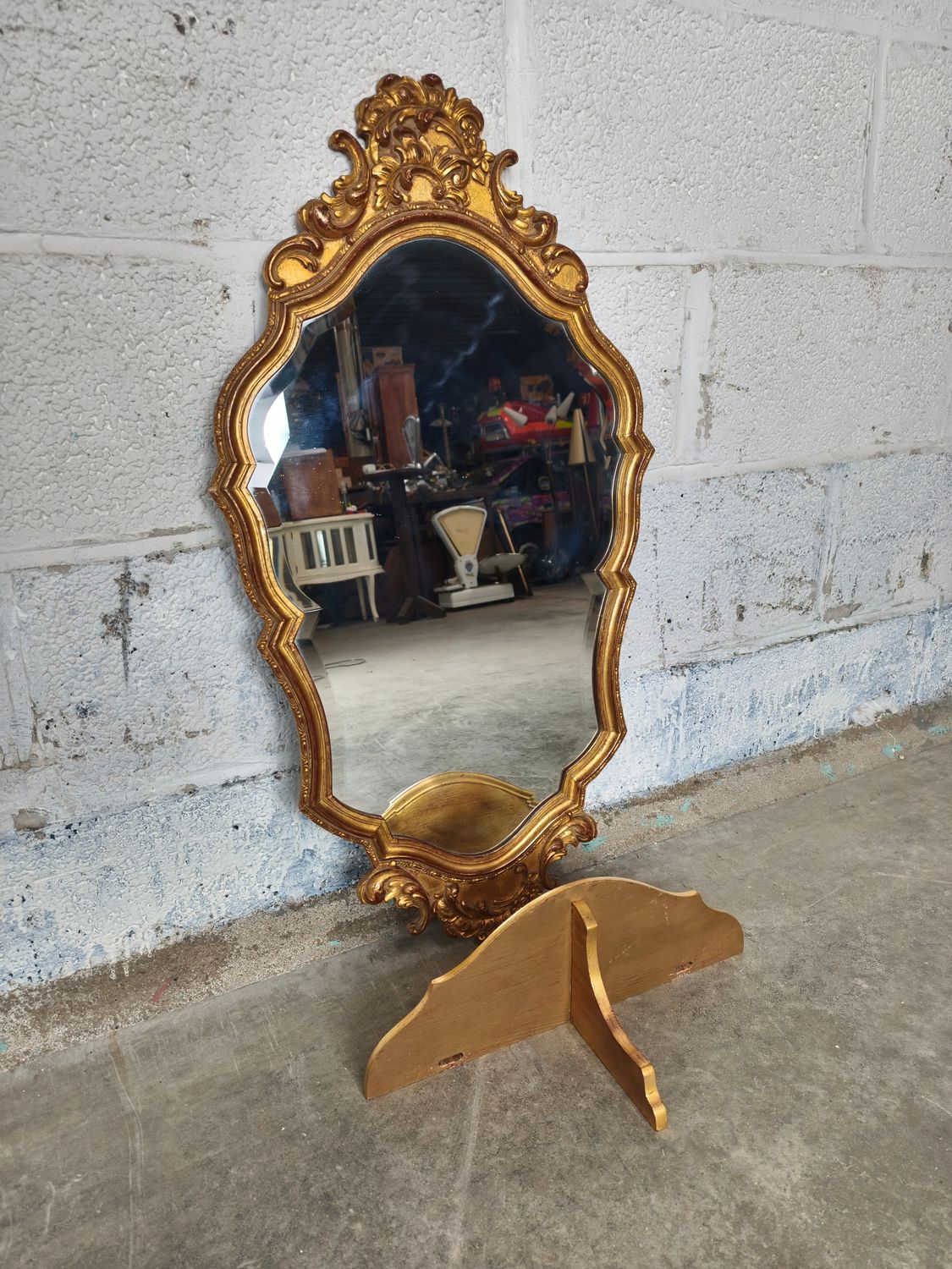 Gilt wooden mirror with consol