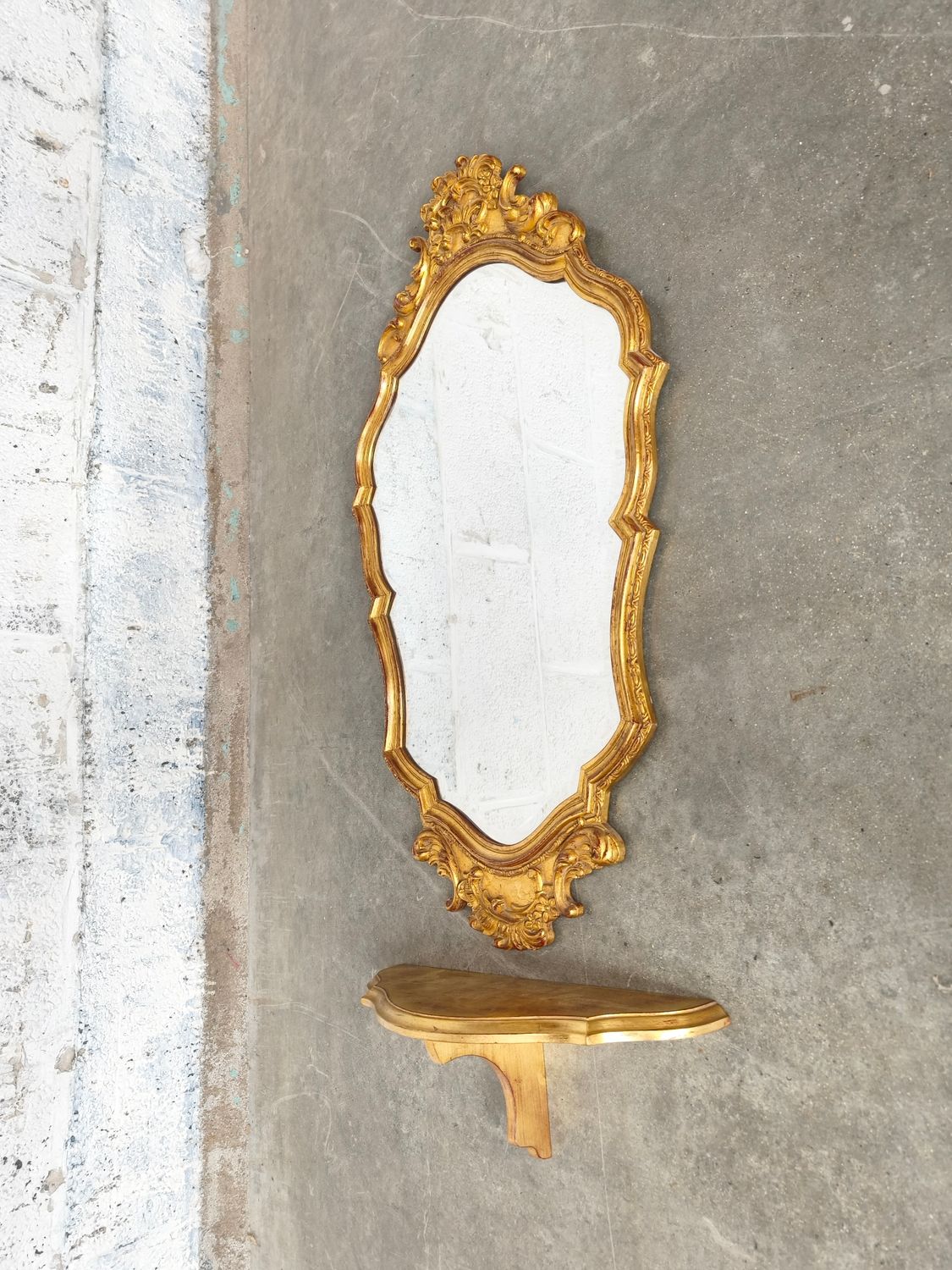 Gilt wooden mirror with consol