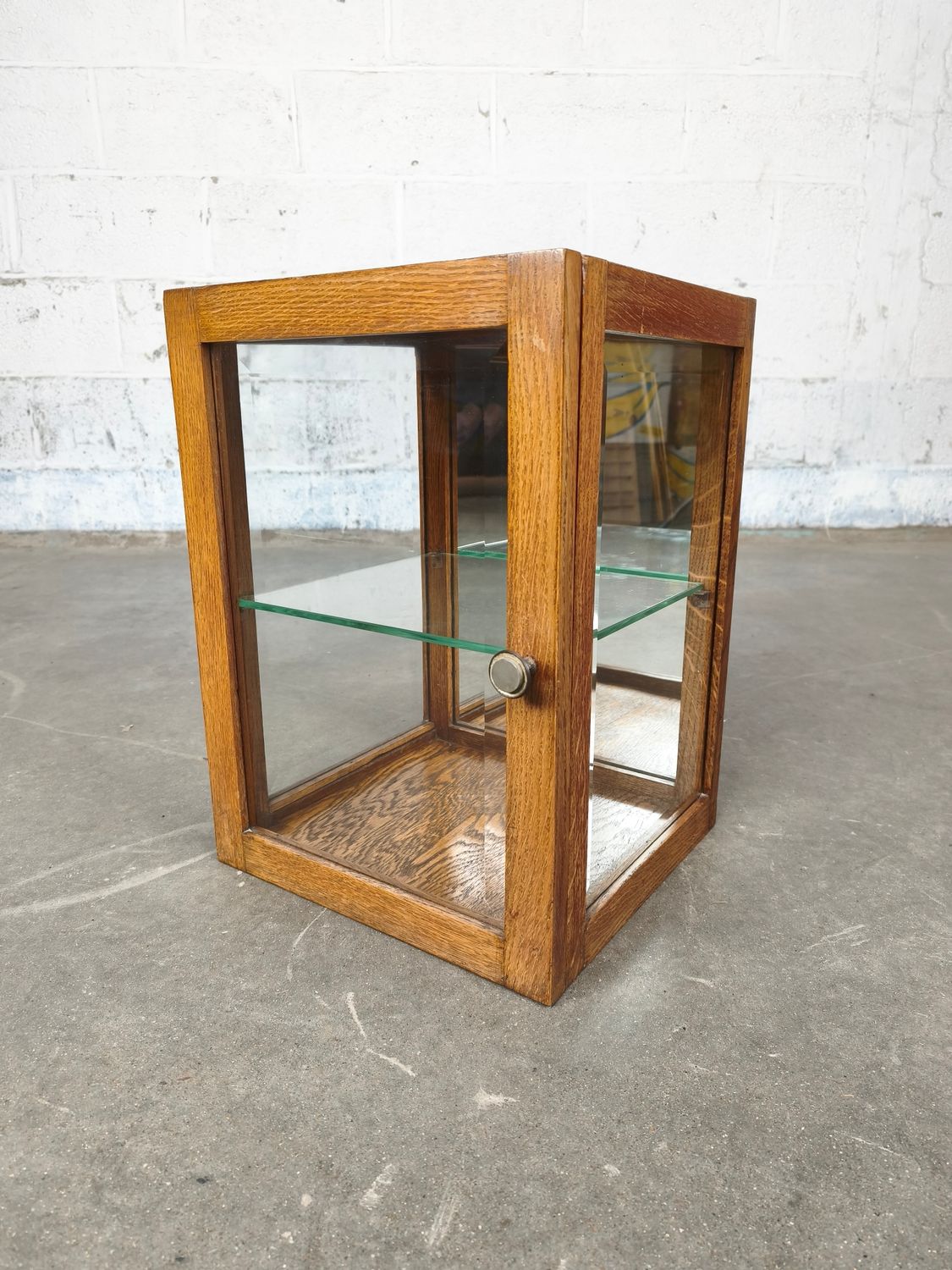 small wooden display cabinet