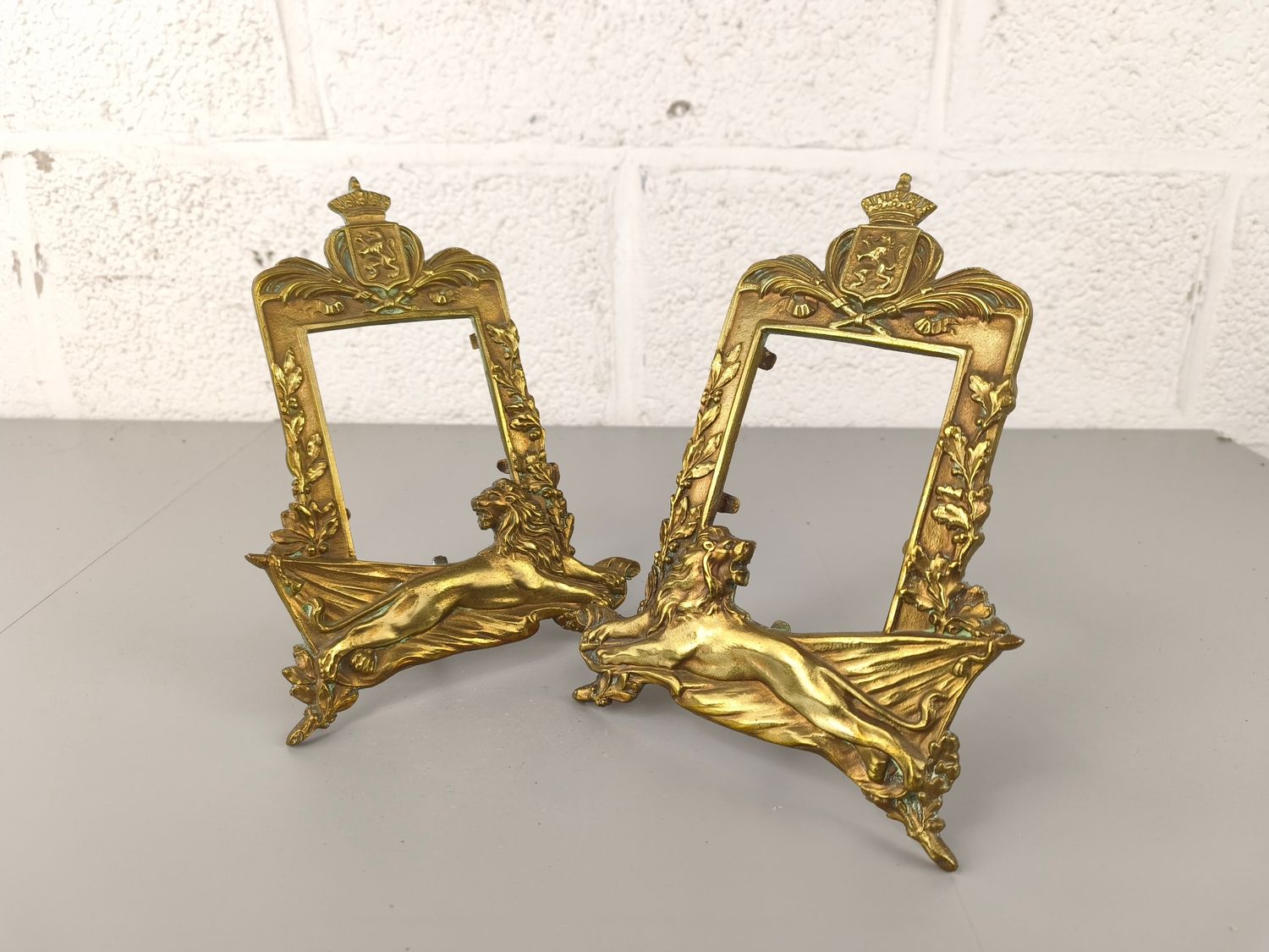 Pair of Belgian picture frames with lions