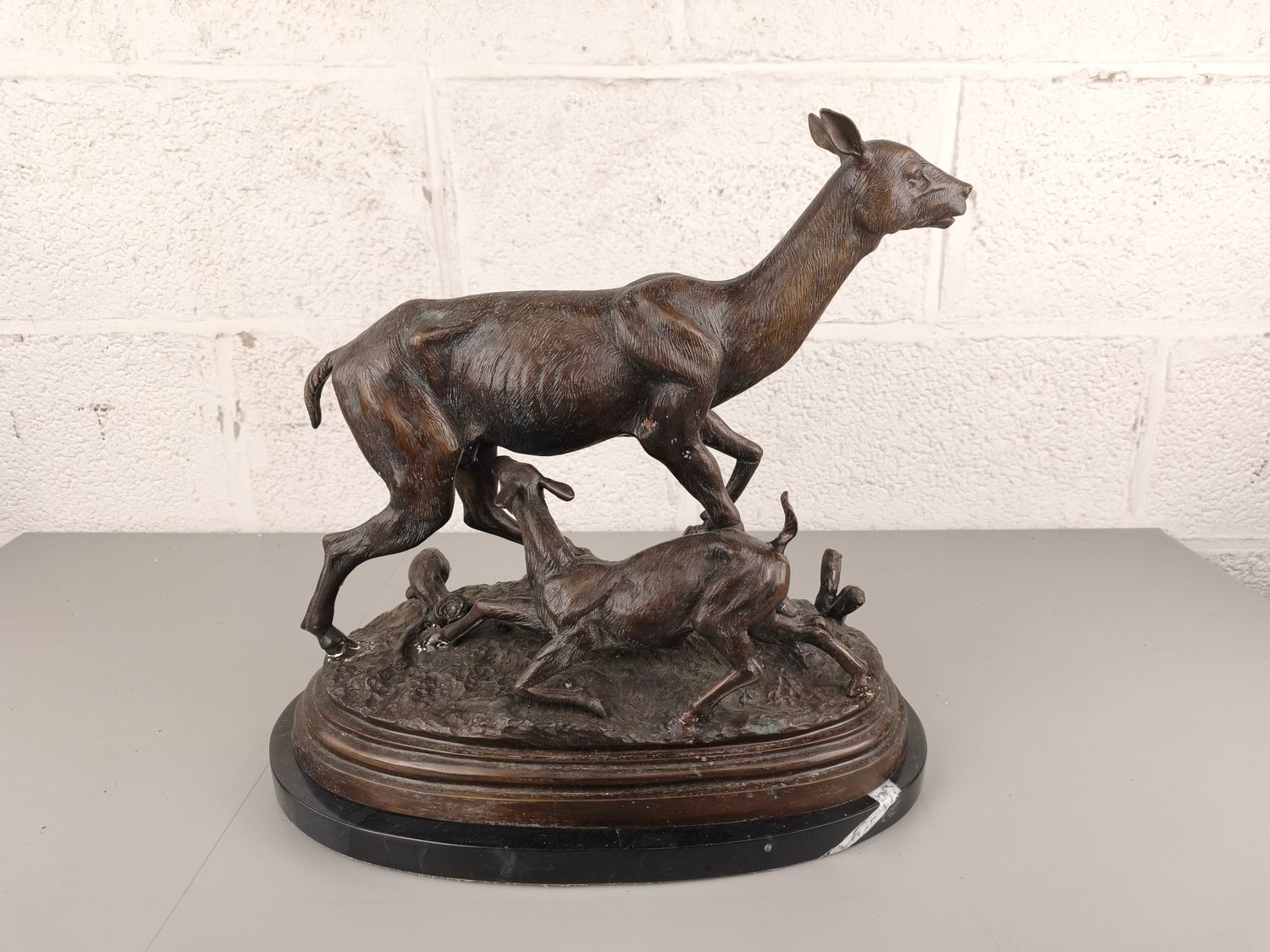 Bronze statue of deer
