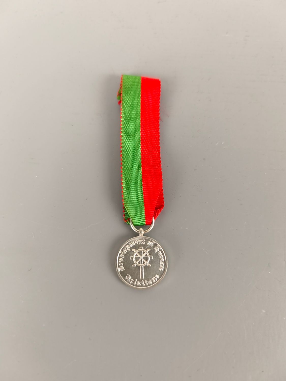 Mini medal development of human relations