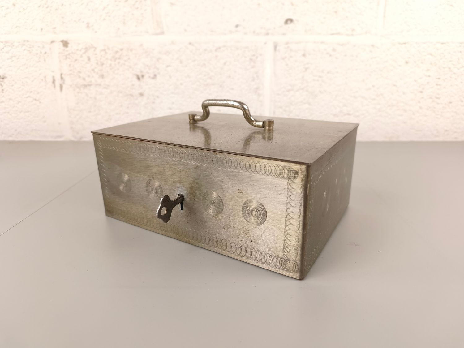 Old metal money case