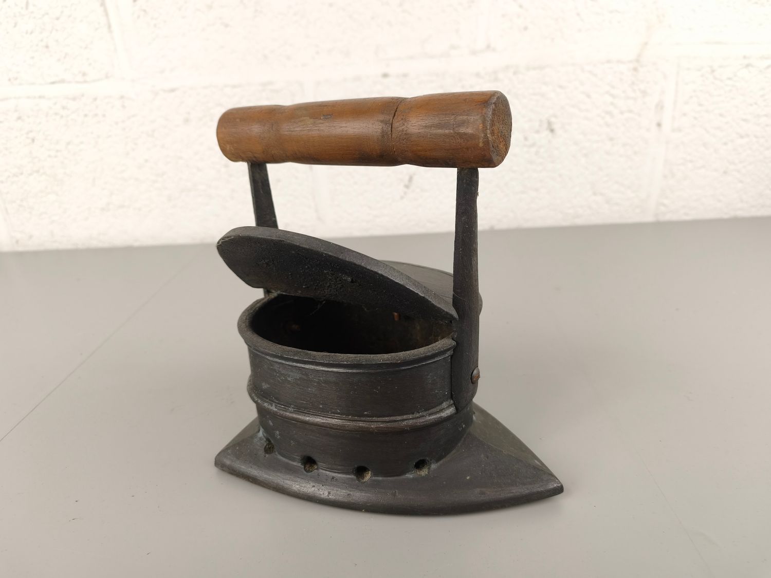 Large antique coal iron