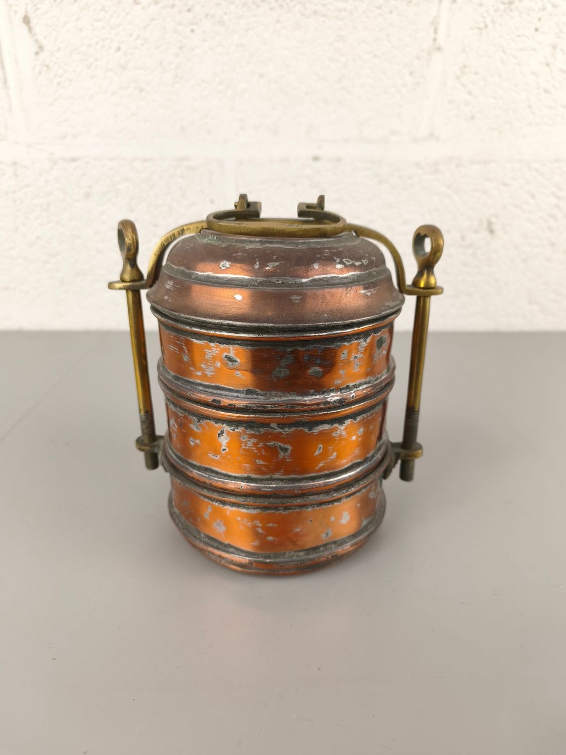 Old copper stackable lunchbox