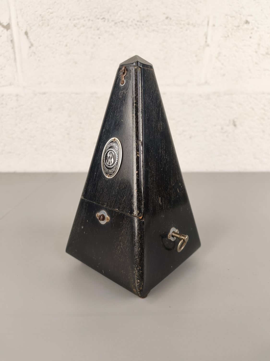 Antique wooden metronome