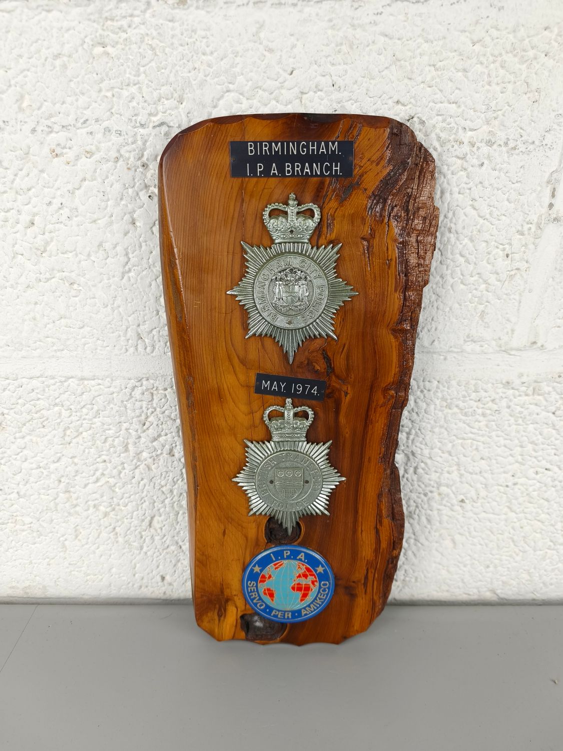 Two emblems from the British police