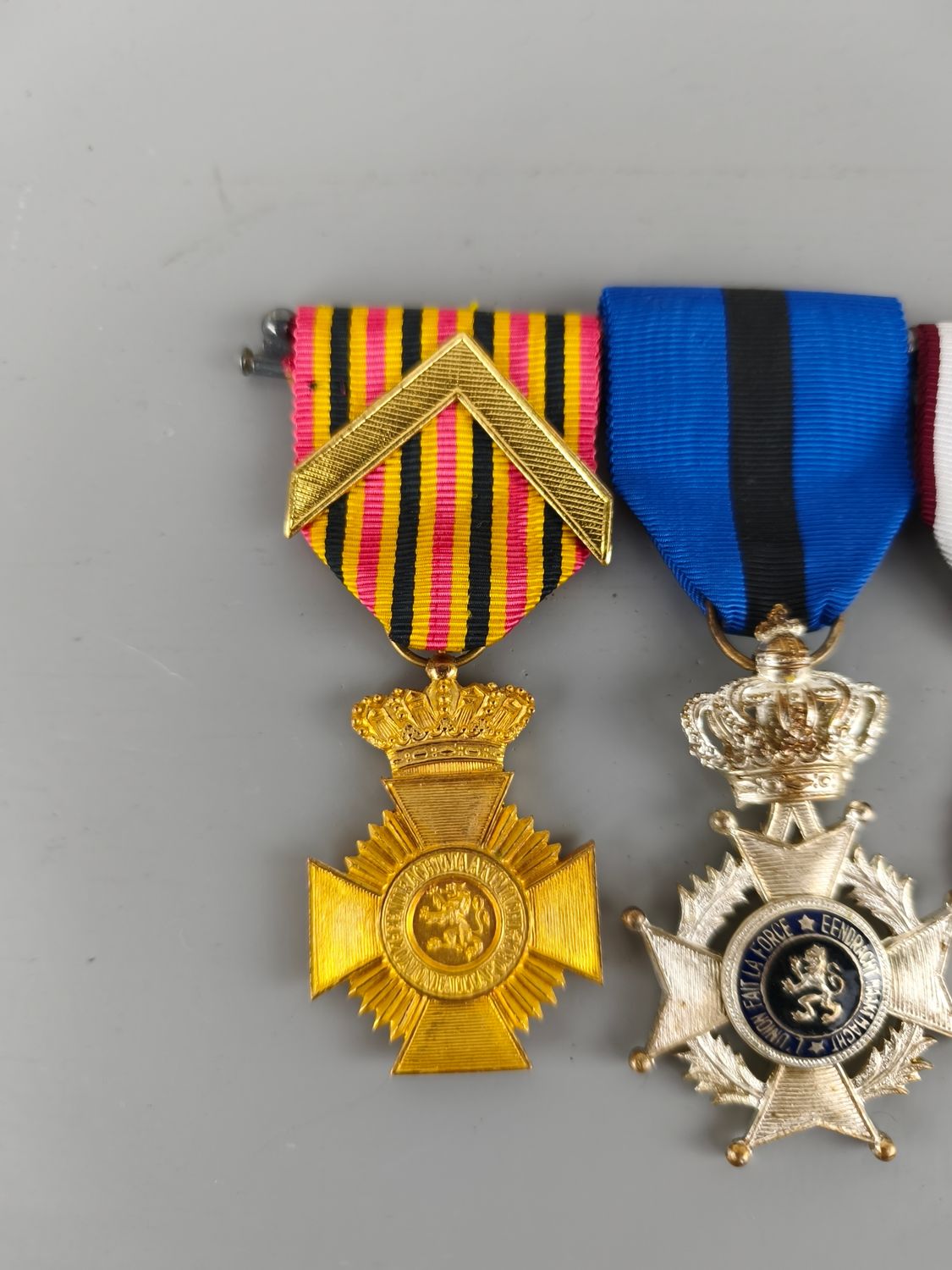 3 Belgian medals on bar with ribbon bar
