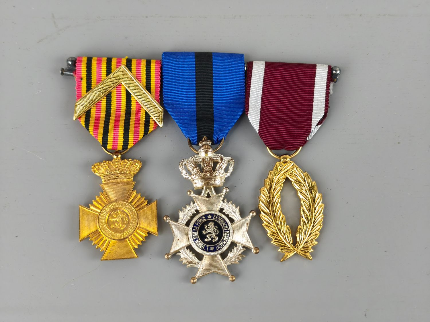 3 Belgian medals on bar with ribbon bar