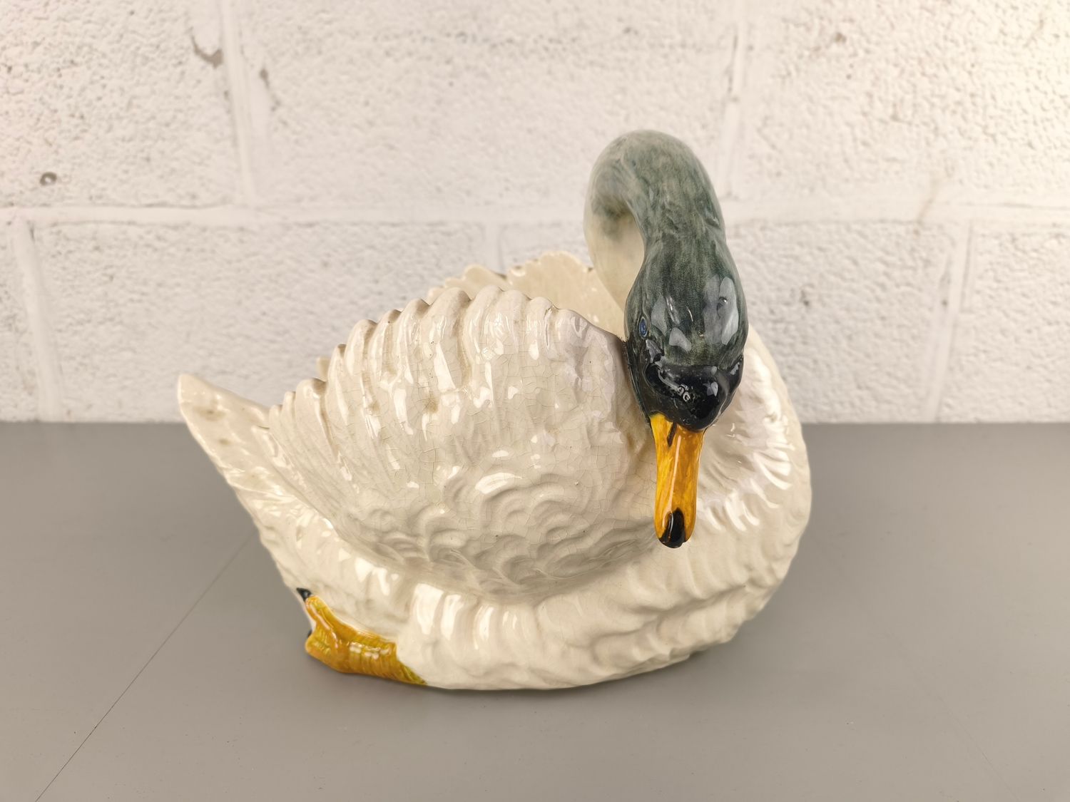 Planter in the shape of a swan