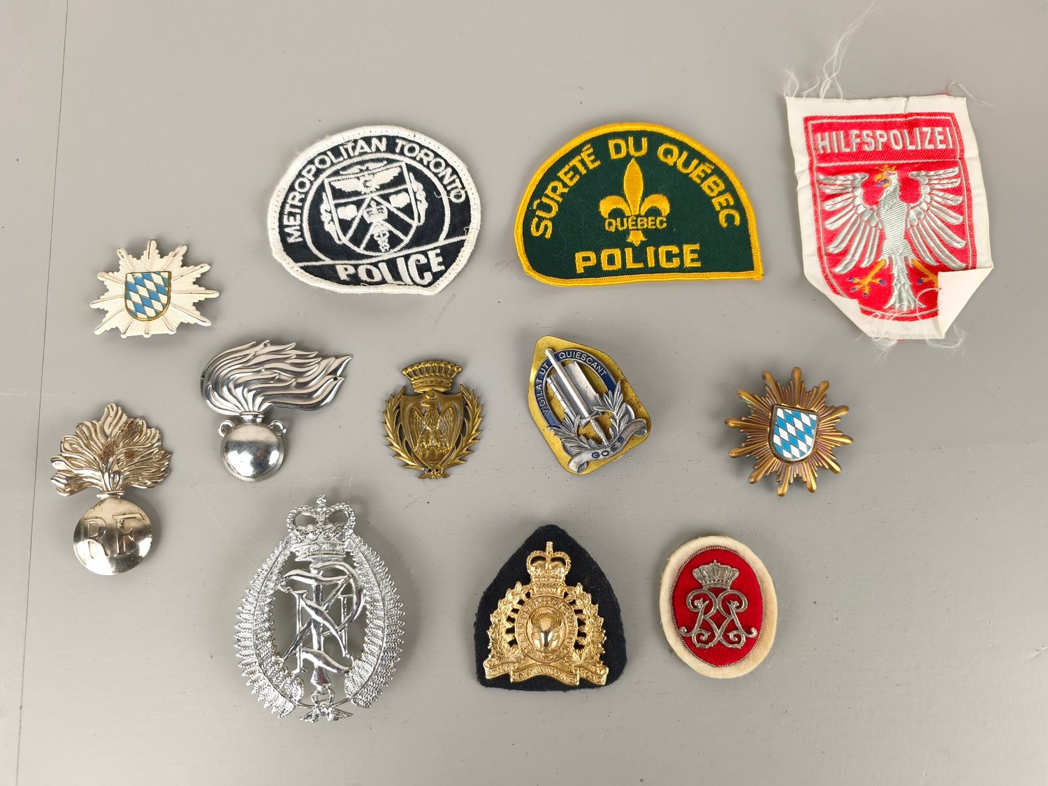 Collection old police insignia from around the world