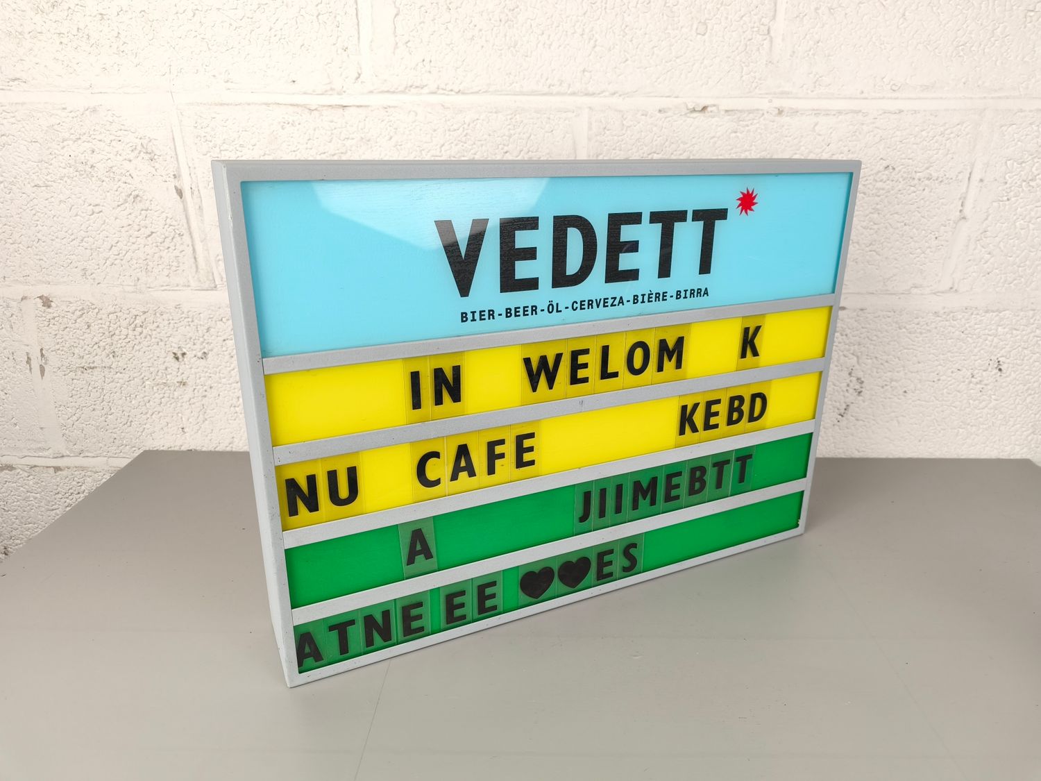 Illuminated advertisement Vedett