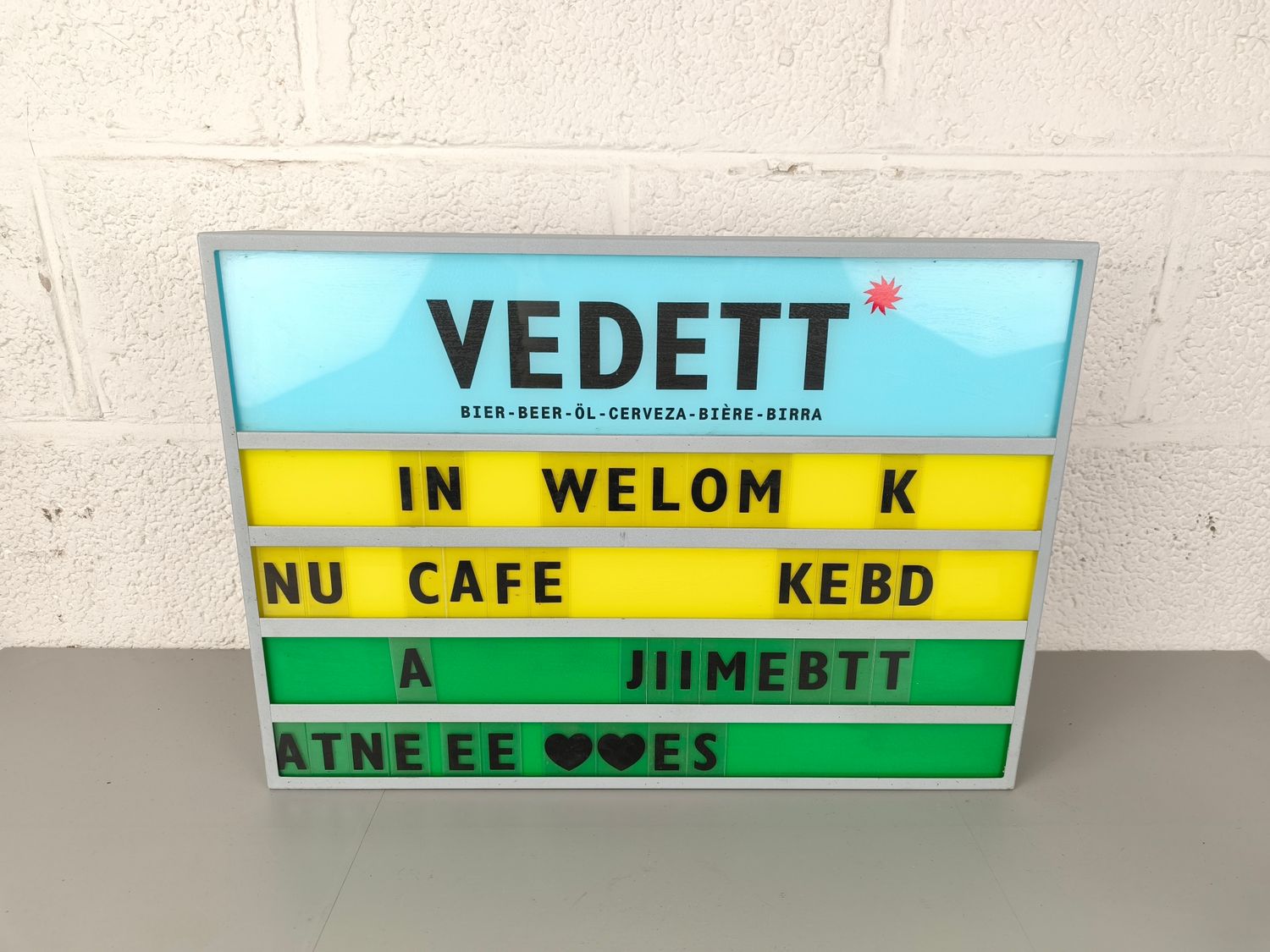Illuminated advertisement Vedett