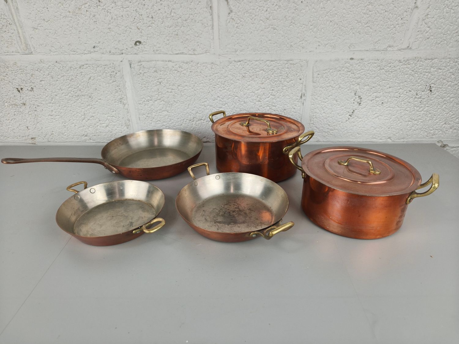 Set of copper pots and pans
